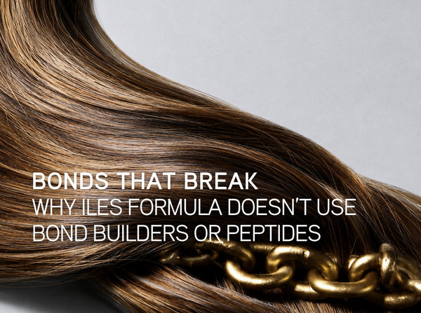 Sweep of glossy highlighted brunette hair draped over a heavy gold chain, illustrating why Iles Formula does not use bond builders or peptides in its haircare formulas.