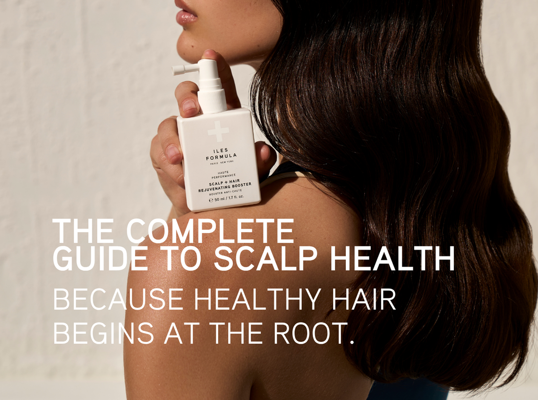 The Complete Guide to Scalp Health cover — woman with glossy dark hair holding the Iles Formula Scalp + Hair Rejuvenating Booster 50ml at her shoulder.