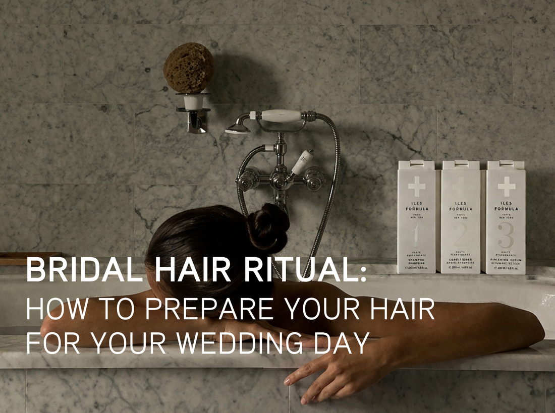 Woman relaxing in marble bath with Iles Formula Shampoo, Conditioner, and Finishing Serum — the bridal hair ritual by Iles Formula