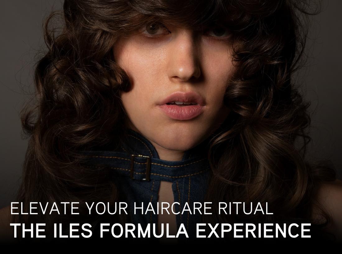 Person with voluminous dark curls looking at the camera, with text overlay that reads: “Elevate your haircare ritual — The Iles Formula Experience.”