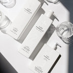 Signature Collection - Family Size Flat Lay with Drinking Glasses; Shampoo 1000ml, Conditioner 1000ml, and Finishing Serum 500ml