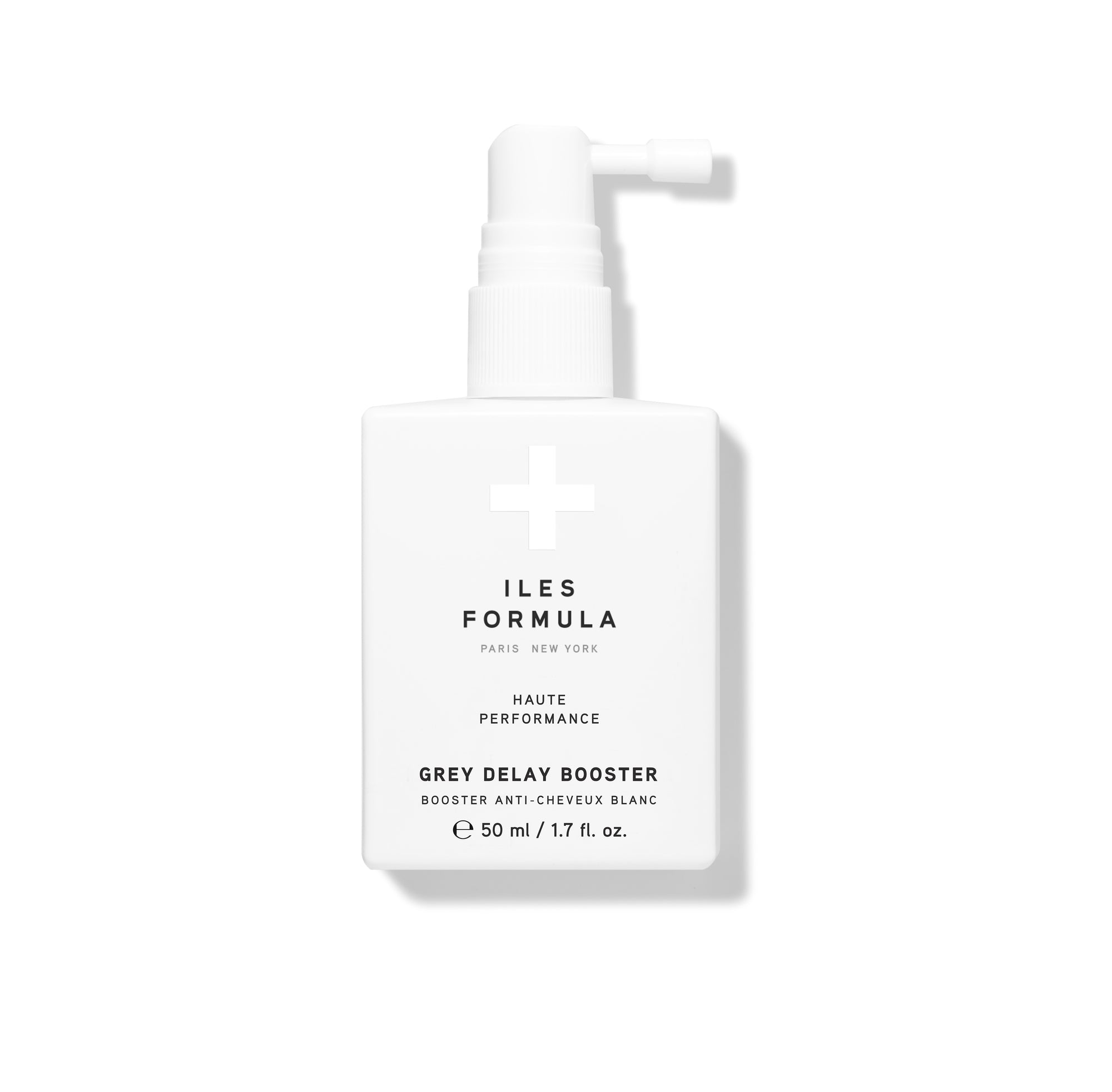 A bottle of Iles Formula Grey Delay Booster, a hair styling product designed to make grey hair delay its growth.