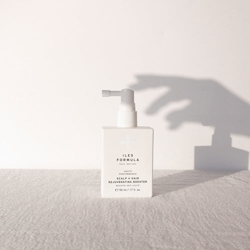 Scalp Hair Rejuvenating Booster With a Shadow of A Hand