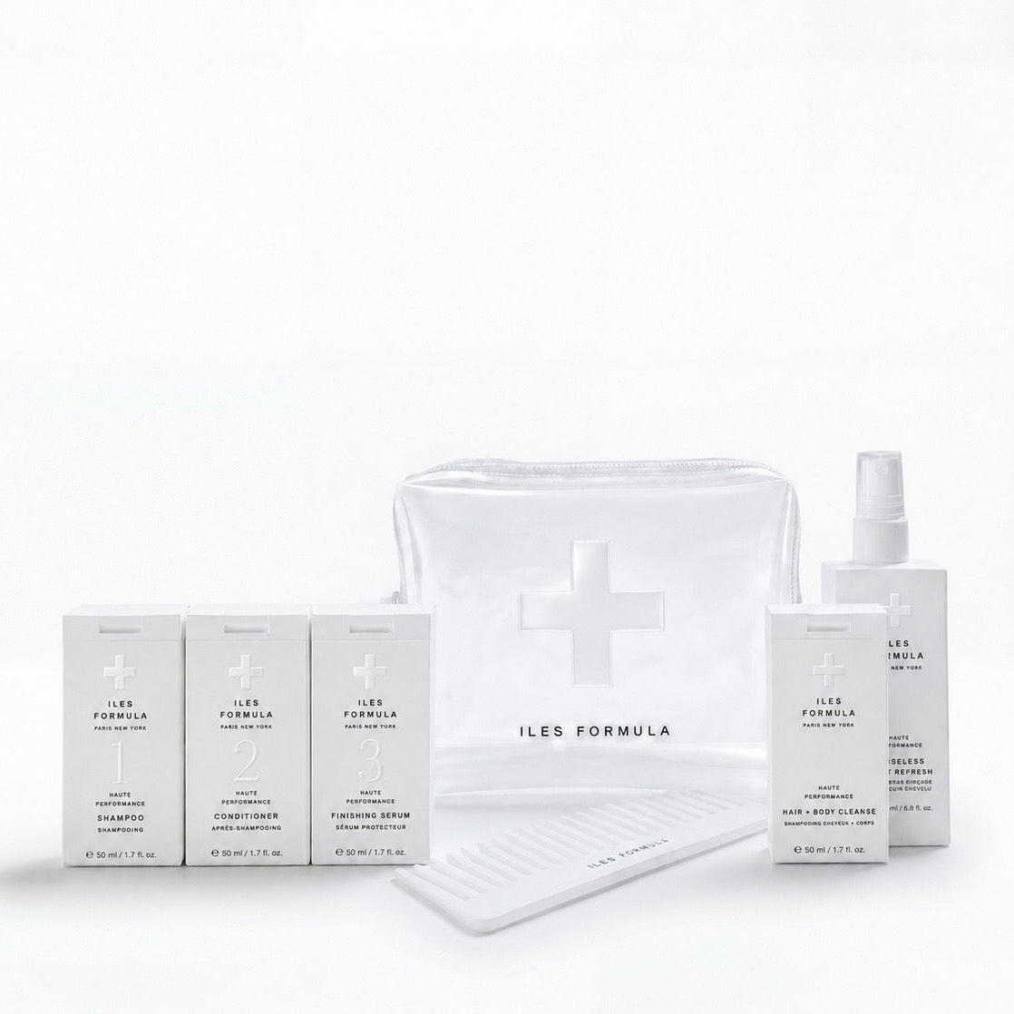 Iles Formula hair care products including bottles, boxes, and a pouch on a white background