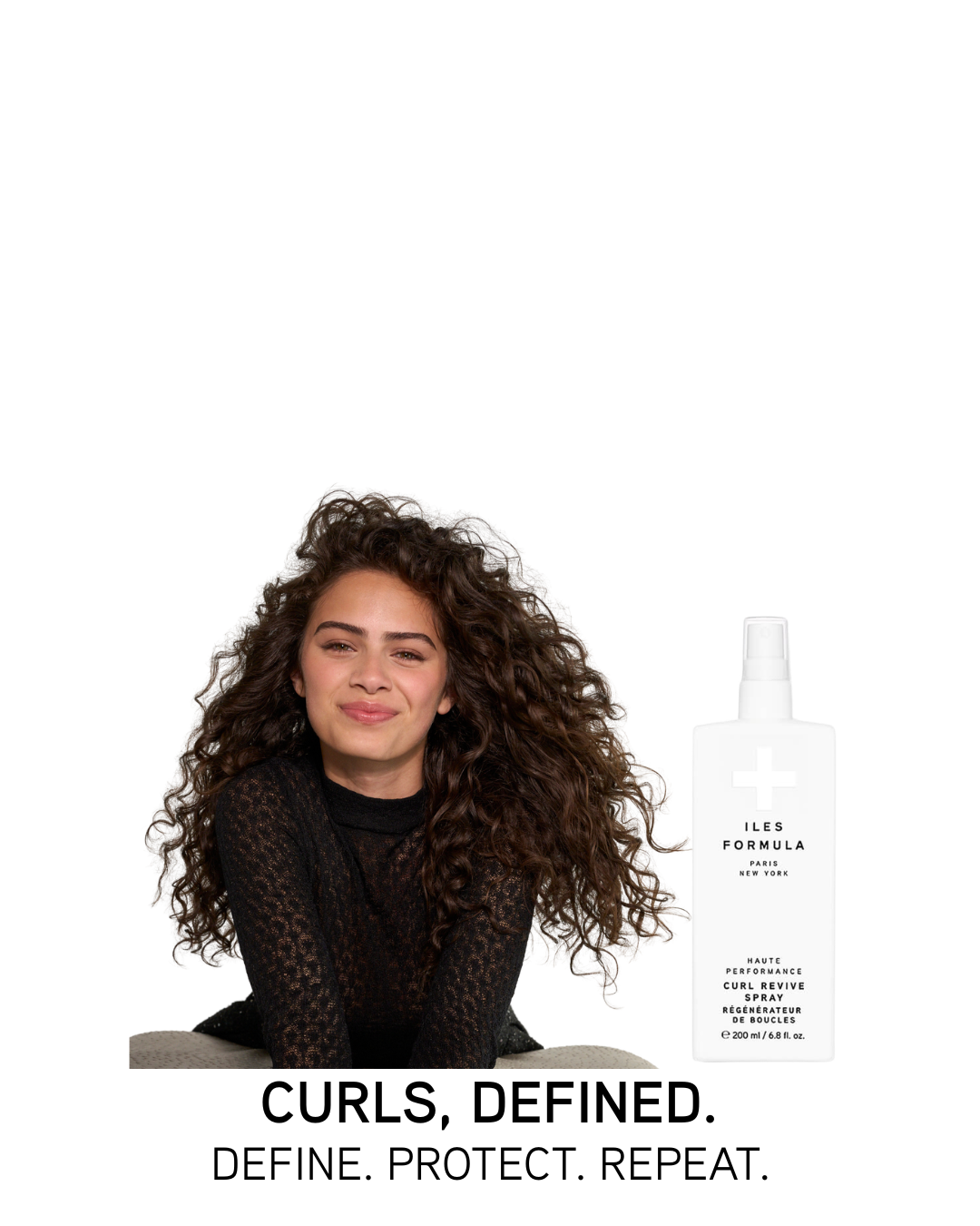 Woman with curly hair next to a bottle of hair product with text 'Curls, Defined.'