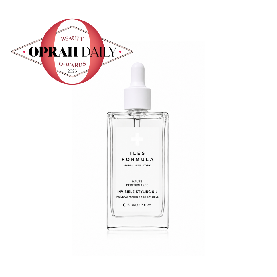 A clear glass dropper bottle of Iles Formula Invisible Styling Oil with a white dropper cap, shown on a white background with a red and white Oprah Daily Beauty Awards badge in the top left corner.
