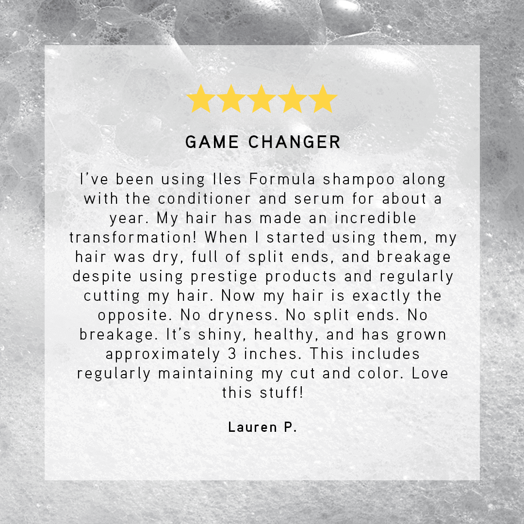 Five-star review for Iles Formula shampoo on a textured gray background